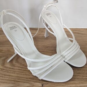 Zara white strap heeled sandals.
